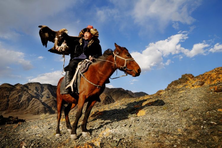 mongolian man with trained eagle PRRSZ54